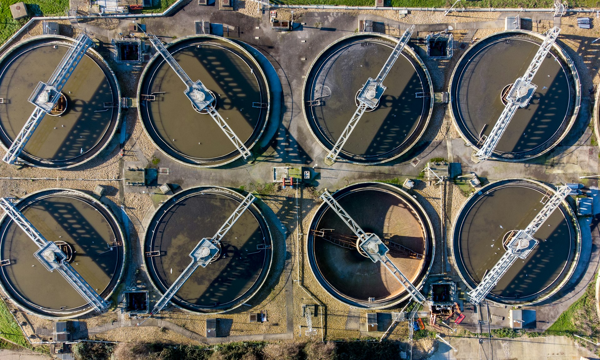 A large group of water tanks next to each other
